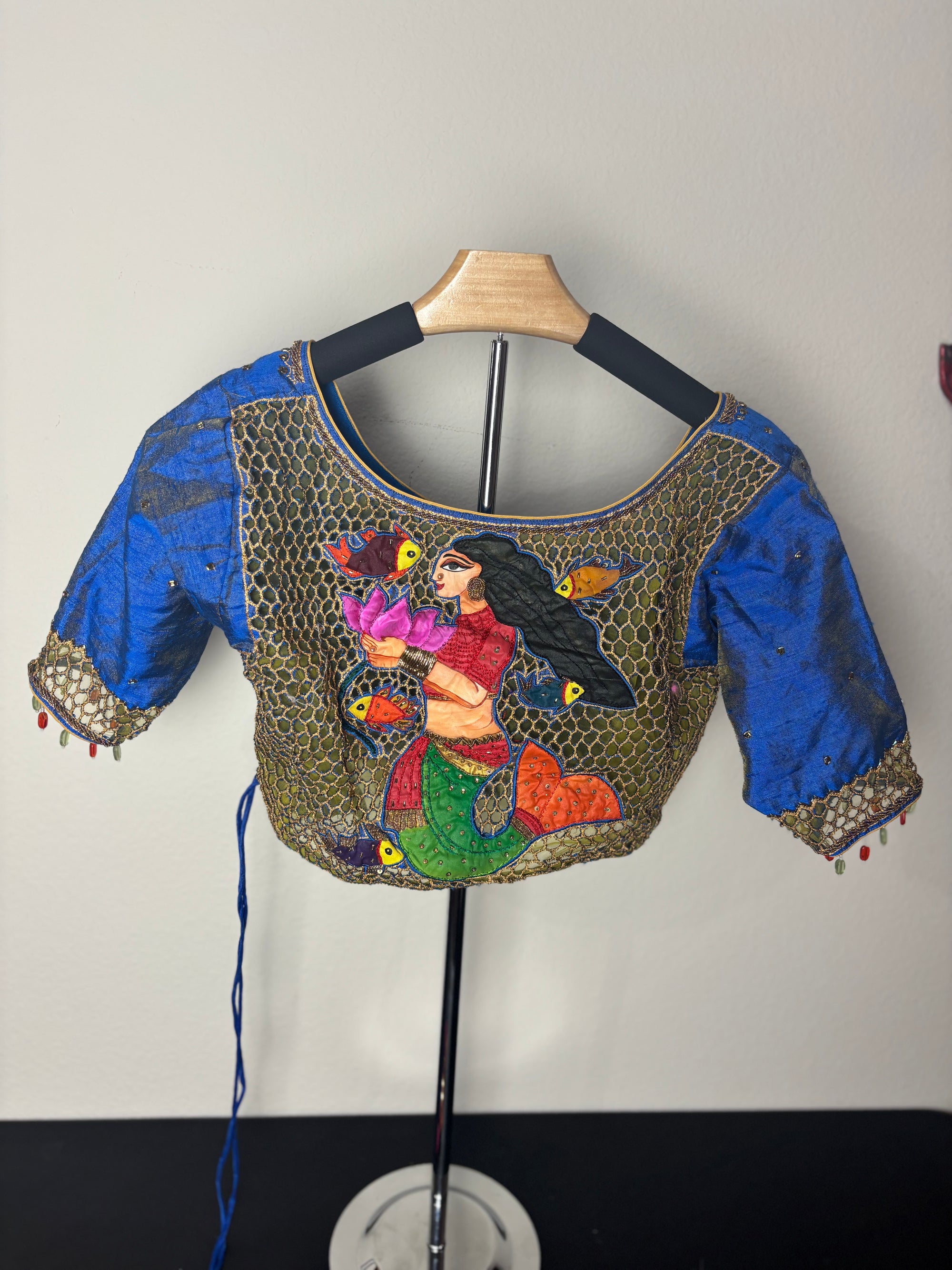 Blue and Gold Painting Blouse with Orange Fishing Tassels with Painting of a Woman on the Back