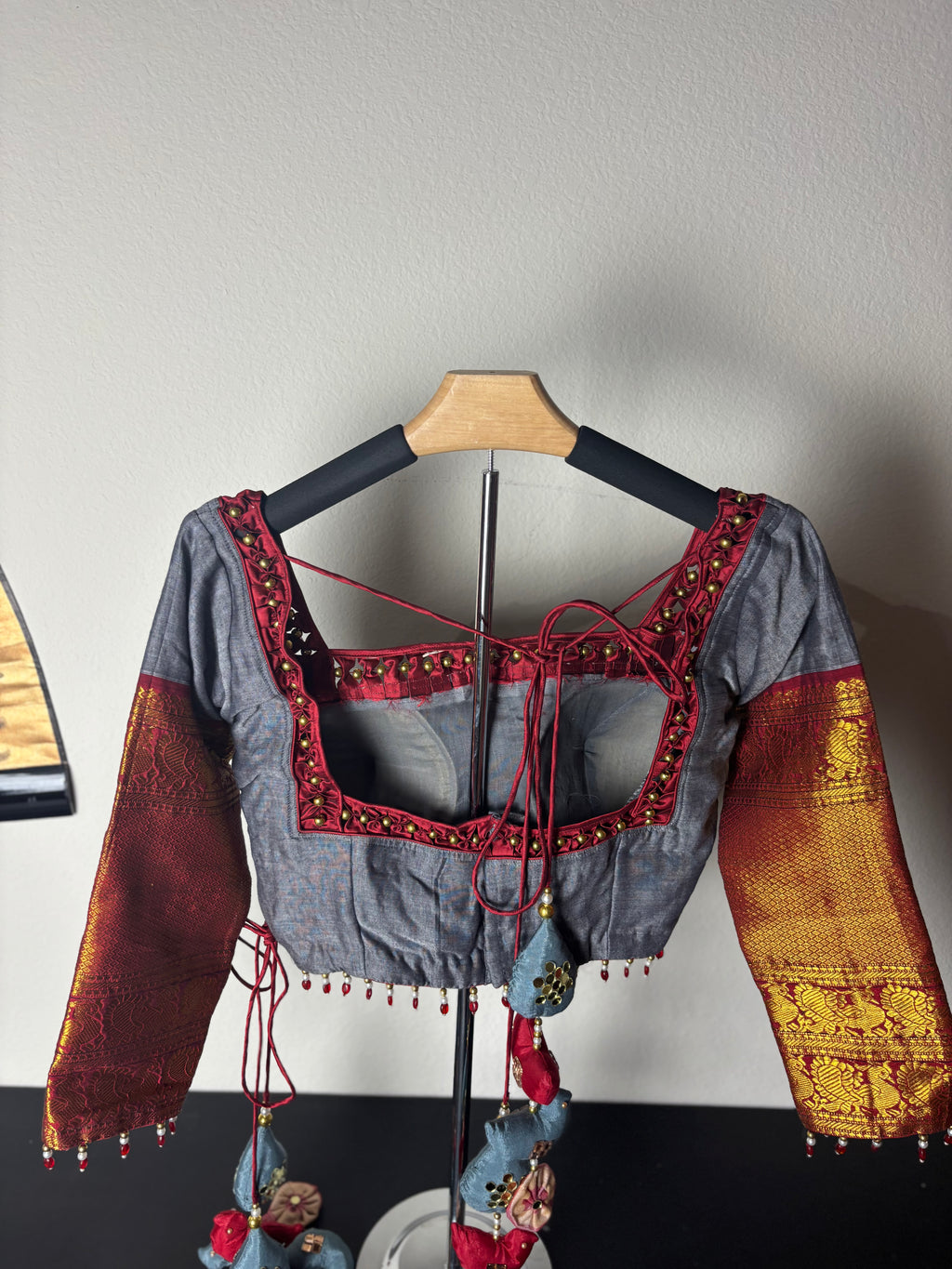 Grey Blouse with Red/Gold Arms and Red Bird tassels with Grey Square Tassels