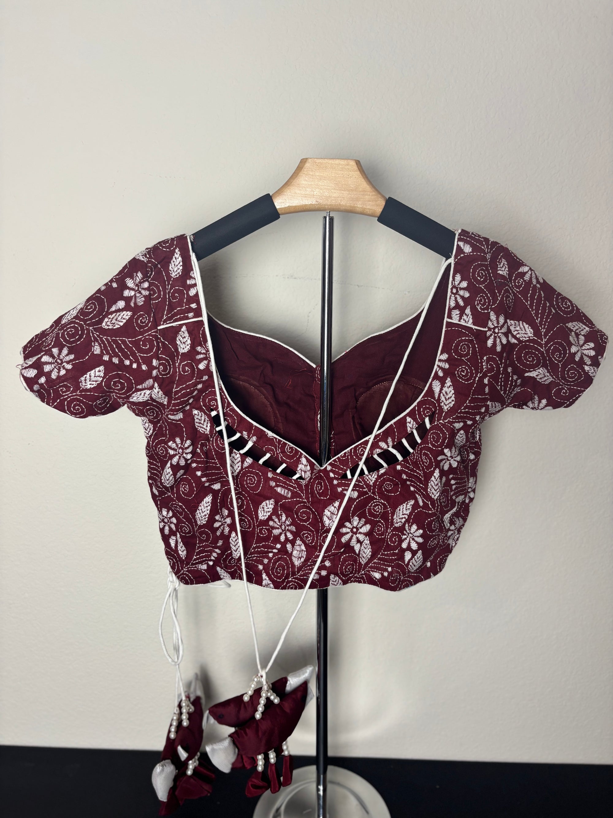 Maroon Blouse with White Patterns and Bird Like Tassels