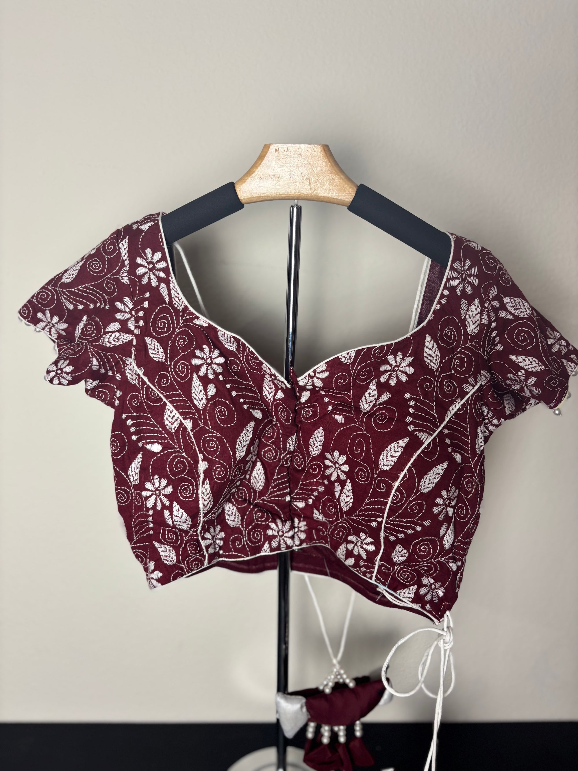 Maroon Blouse with White Patterns and Bird Like Tassels