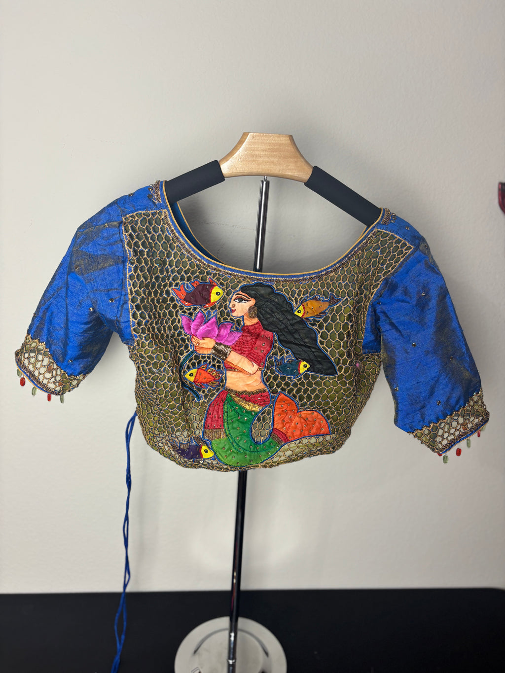 Blue and Gold Painting Blouse with Orange Fishing Tassels with Painting of a Woman on the Back