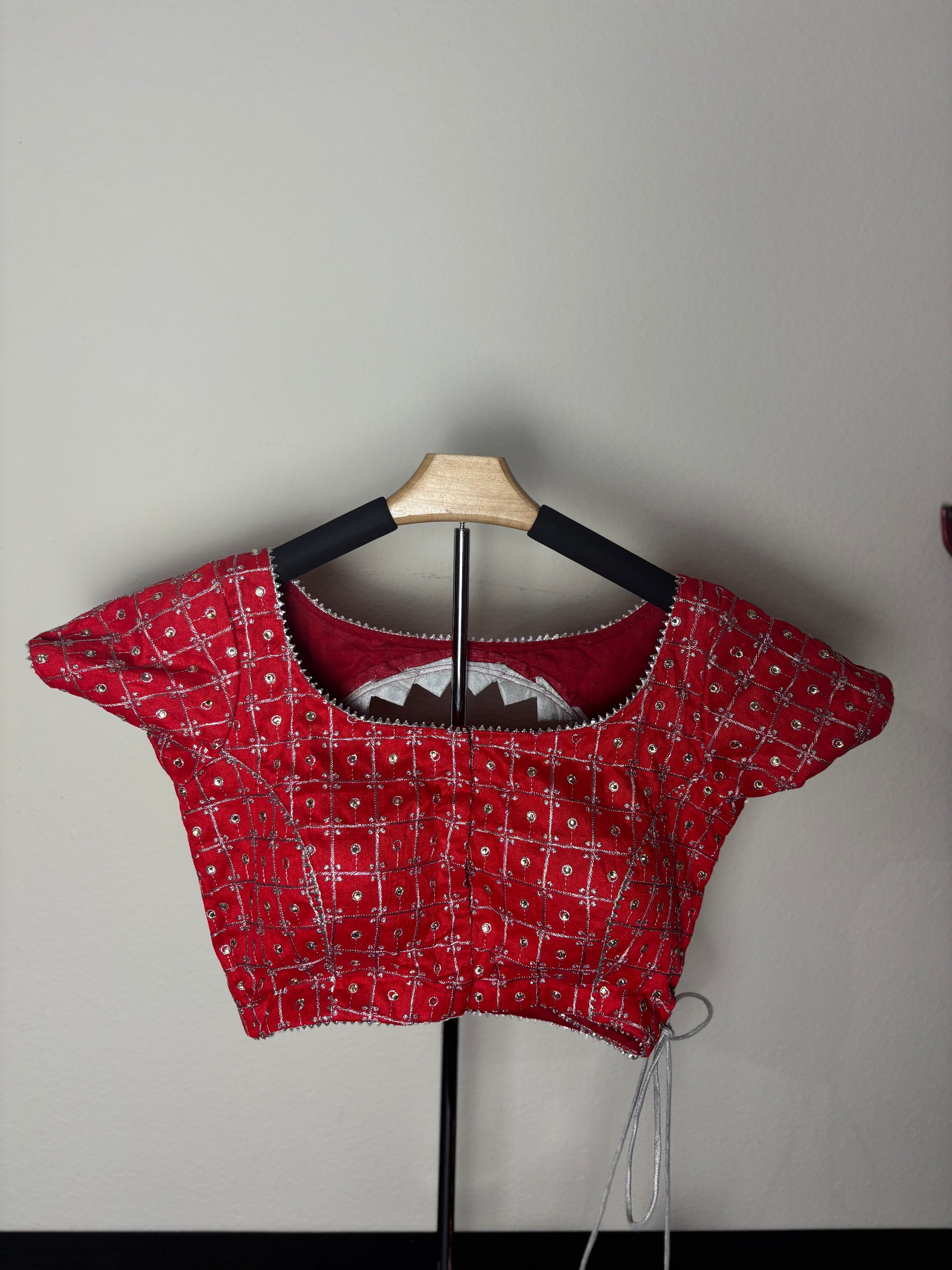 Red Blouse with Crescent Tassels