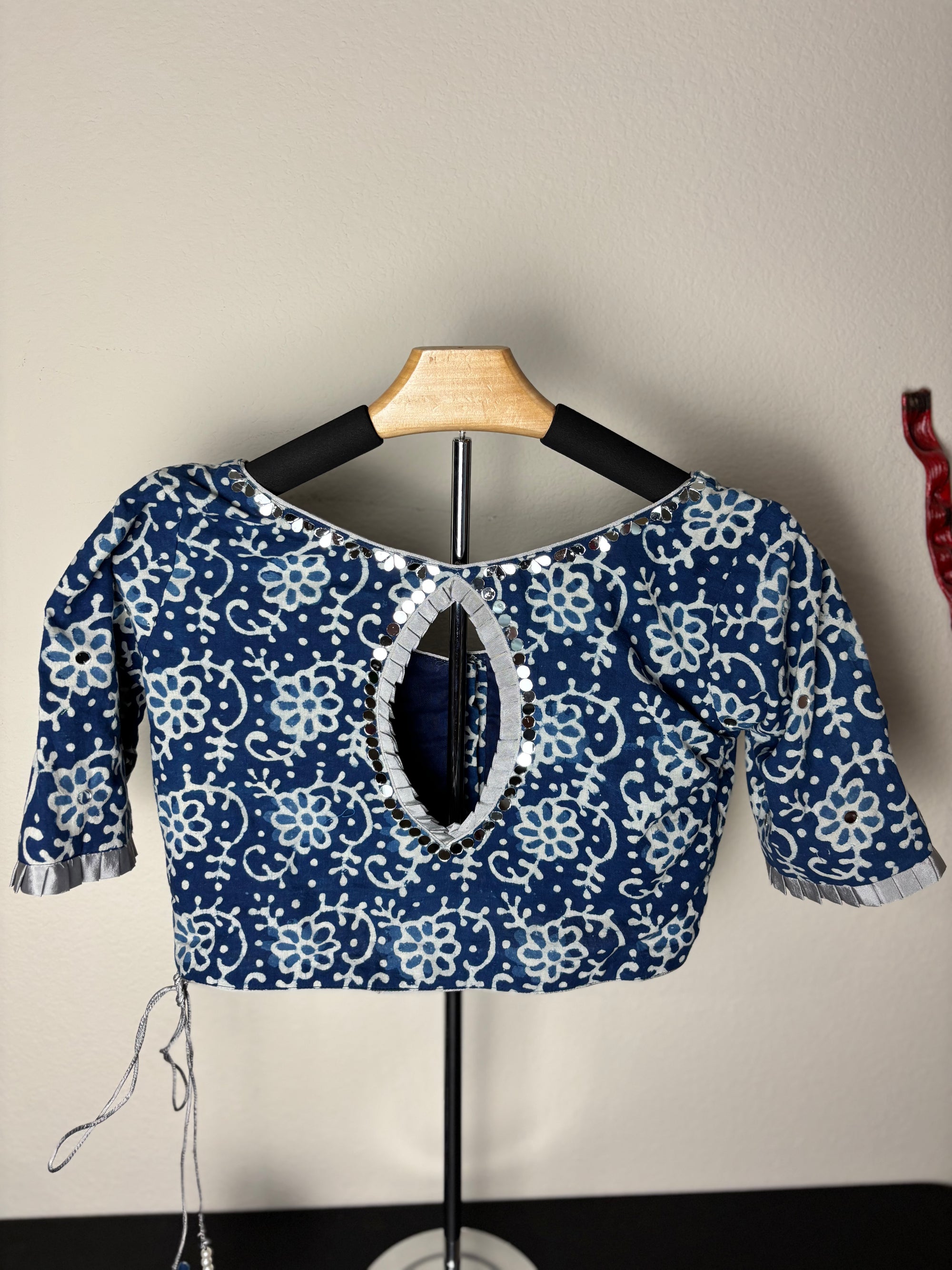 Blue Blouse with Flower Patterns