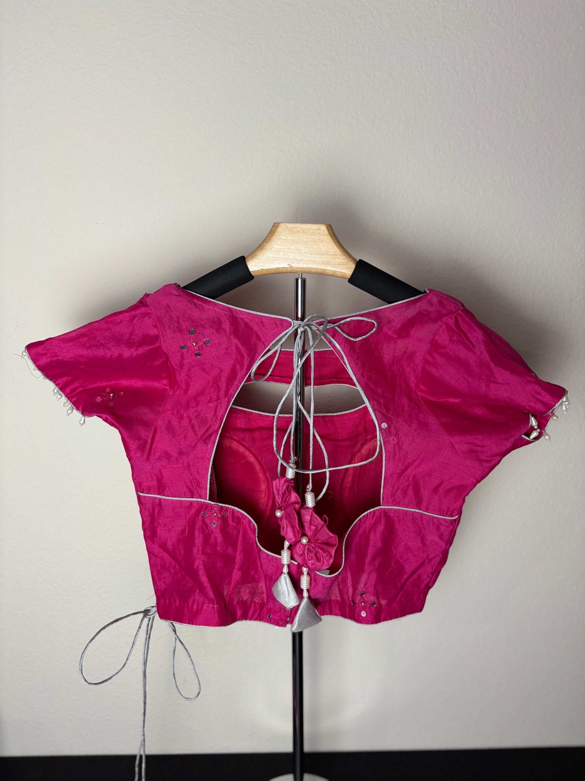 Pink Blouse with Circular Tassels and Silver Additions