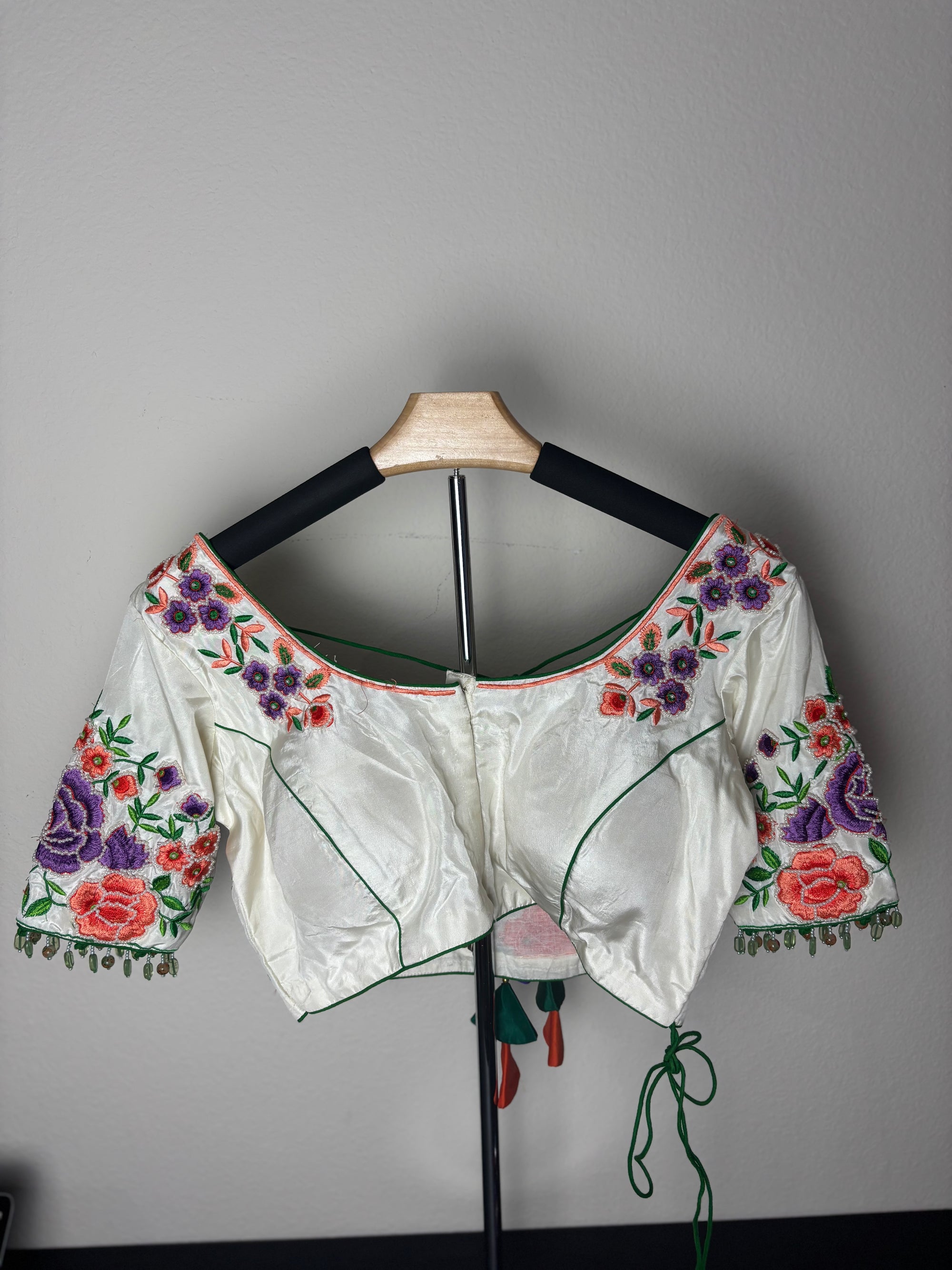 White Blouse with Purple, Orange, & Green Designs on the Hands