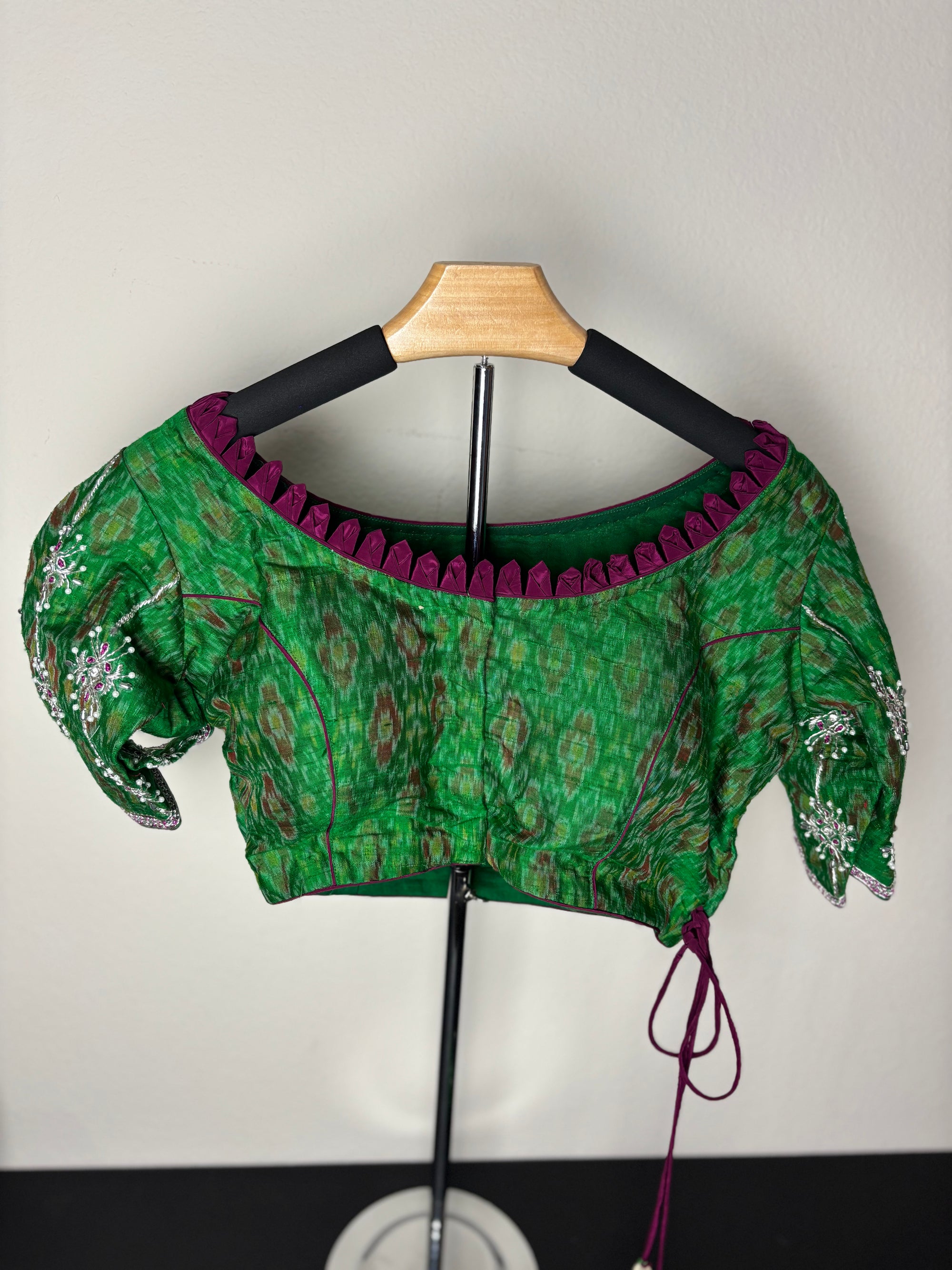 Green Blouse with Purple Details and Triangular & Square Tassels