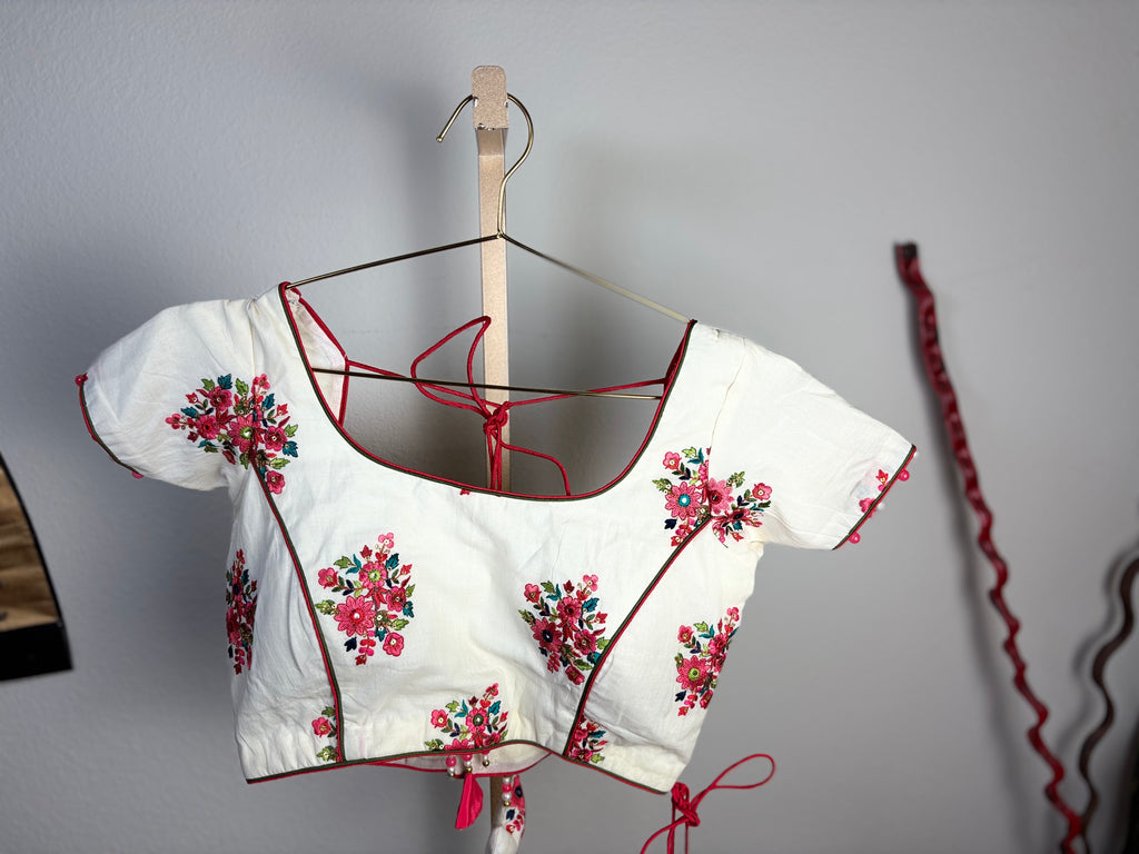 White Blouse with Pink and Green Designs and Arrow Like Tassels