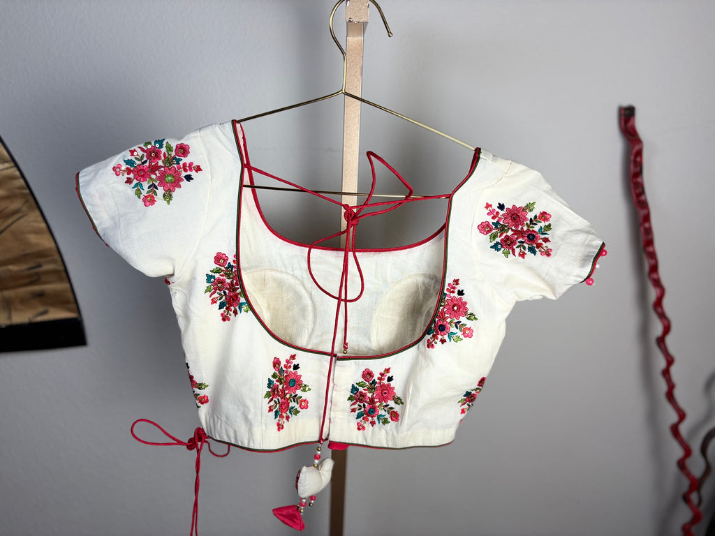 White Blouse with Pink and Green Designs and Arrow Like Tassels