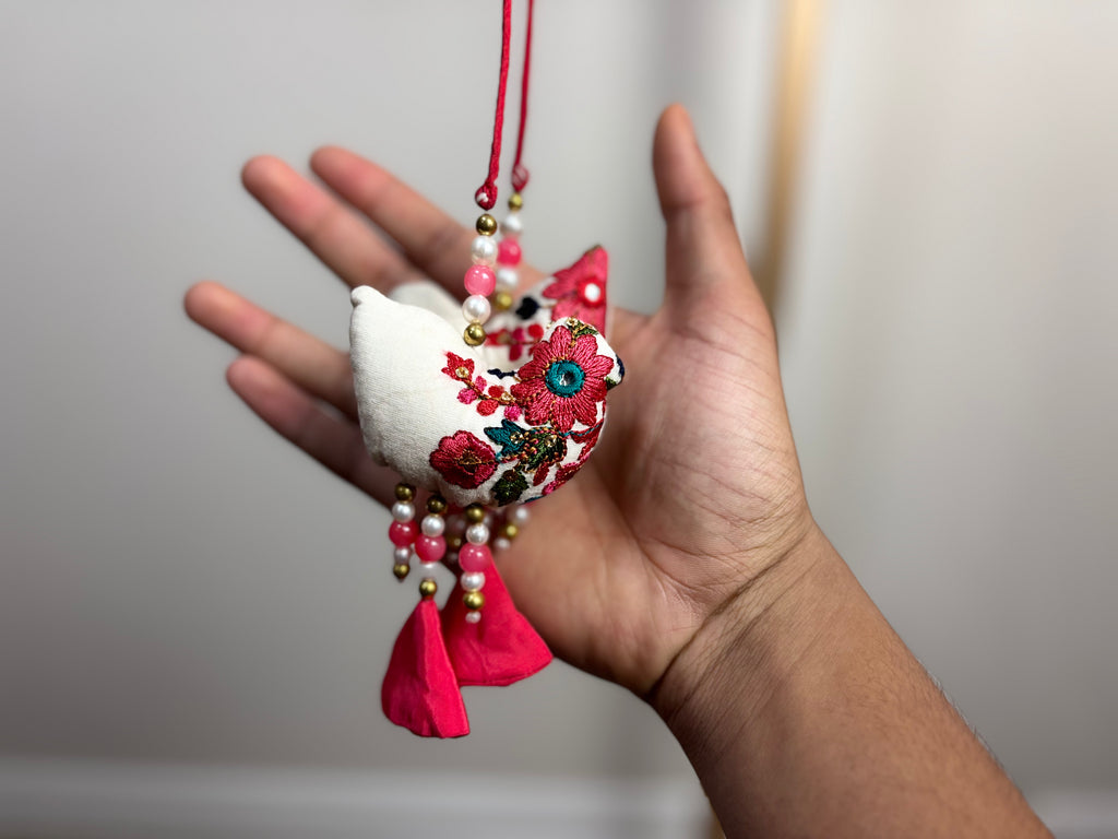 White Blouse with Pink and Green Designs and Arrow Like Tassels
