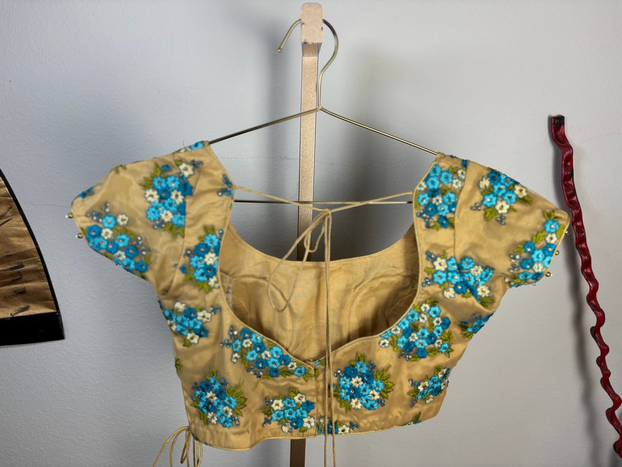 Beige and Light Blue Blouse with Blue Tassel Designs