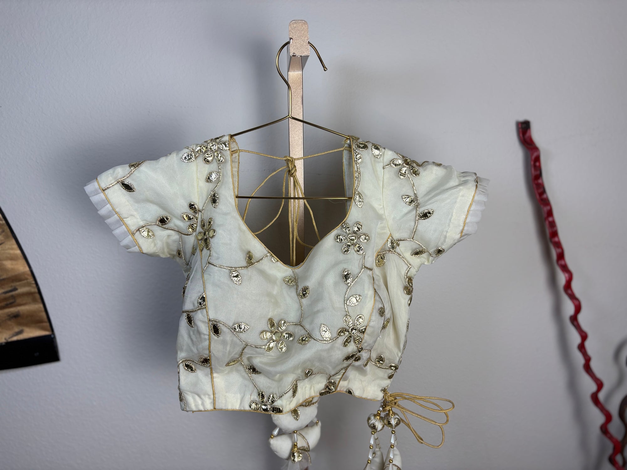 White Blouse with Golden Designs and Crescent Tassels