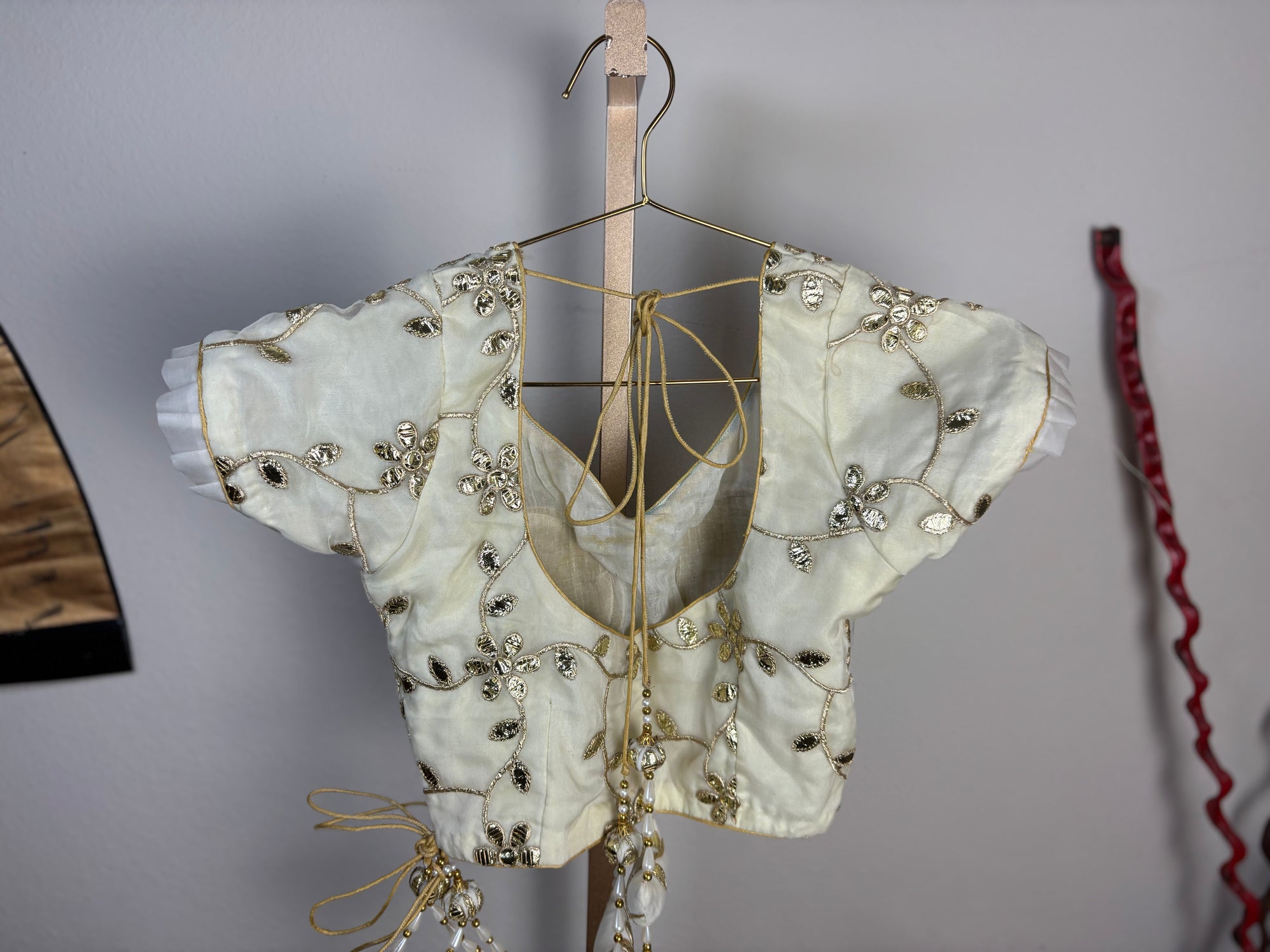 White Blouse with Golden Designs and Crescent Tassels