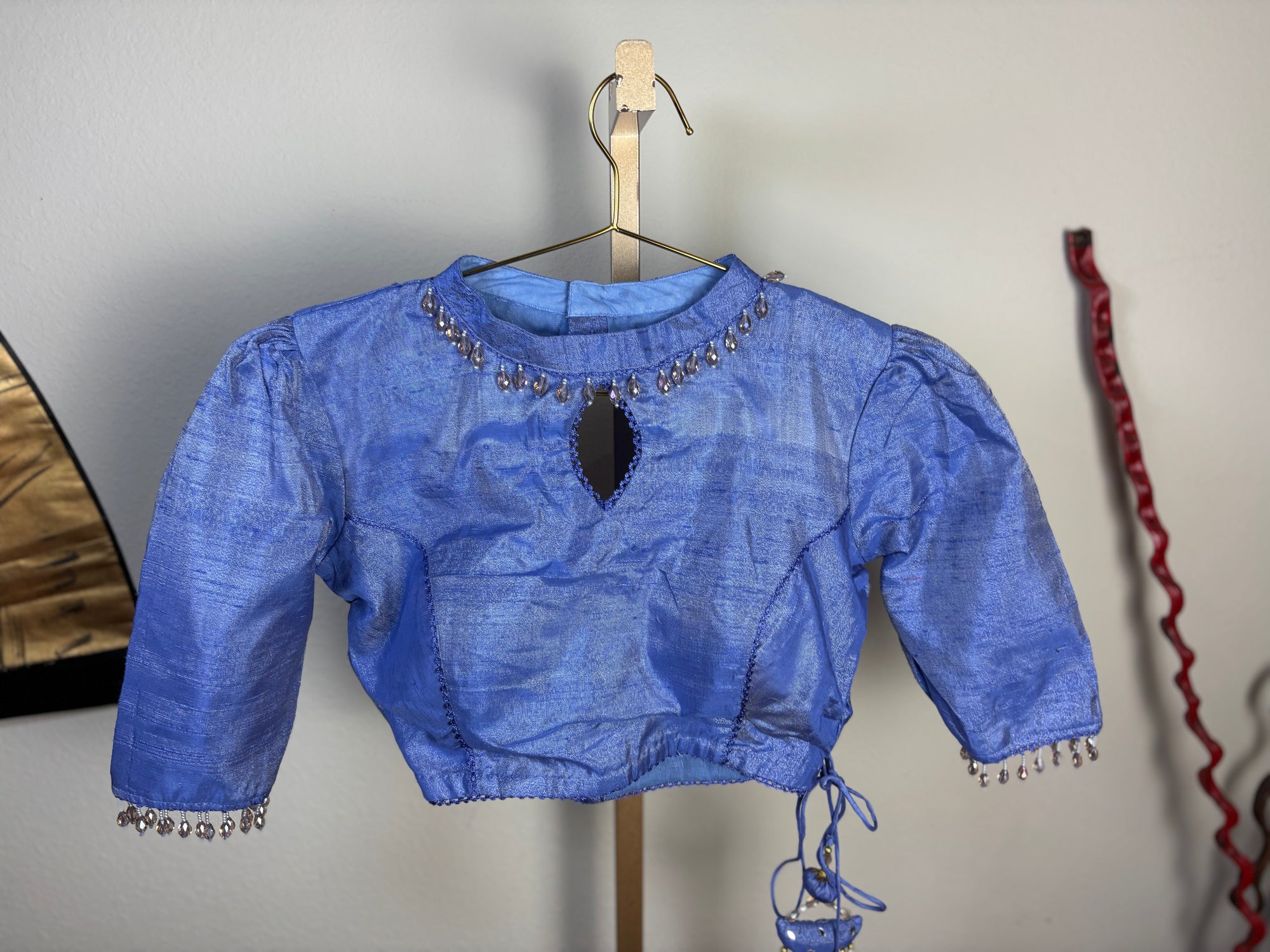 Sky Blue Blouse with Tassels with Golden Details