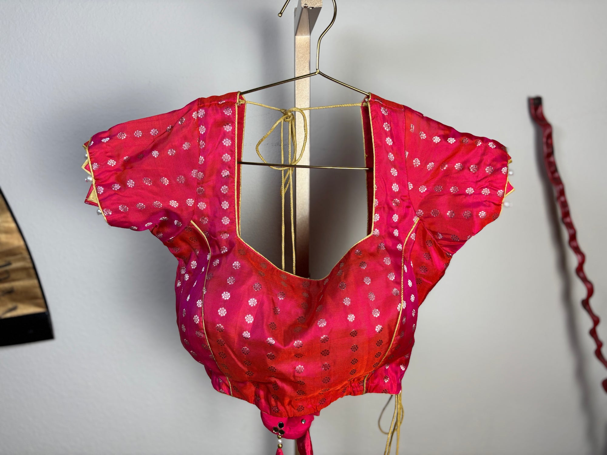 Pink Blouse with Circle Designs and Bird Tassels