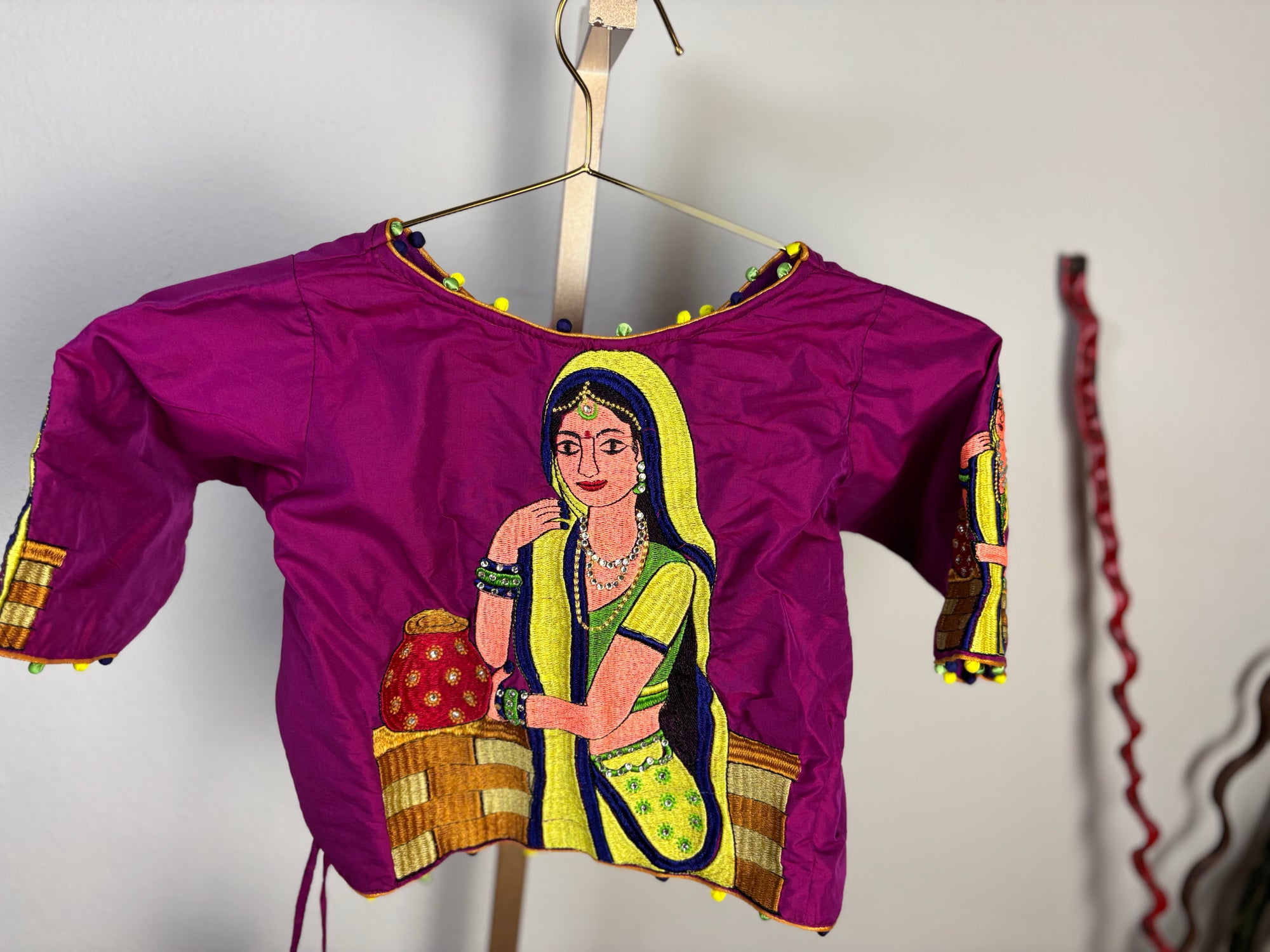 Purple Blouse with Woman on the Back design