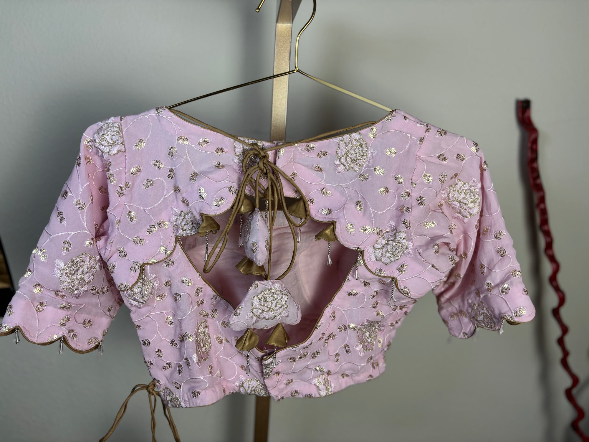 Pink Blouse with Triangle Tassels and Silver Designs