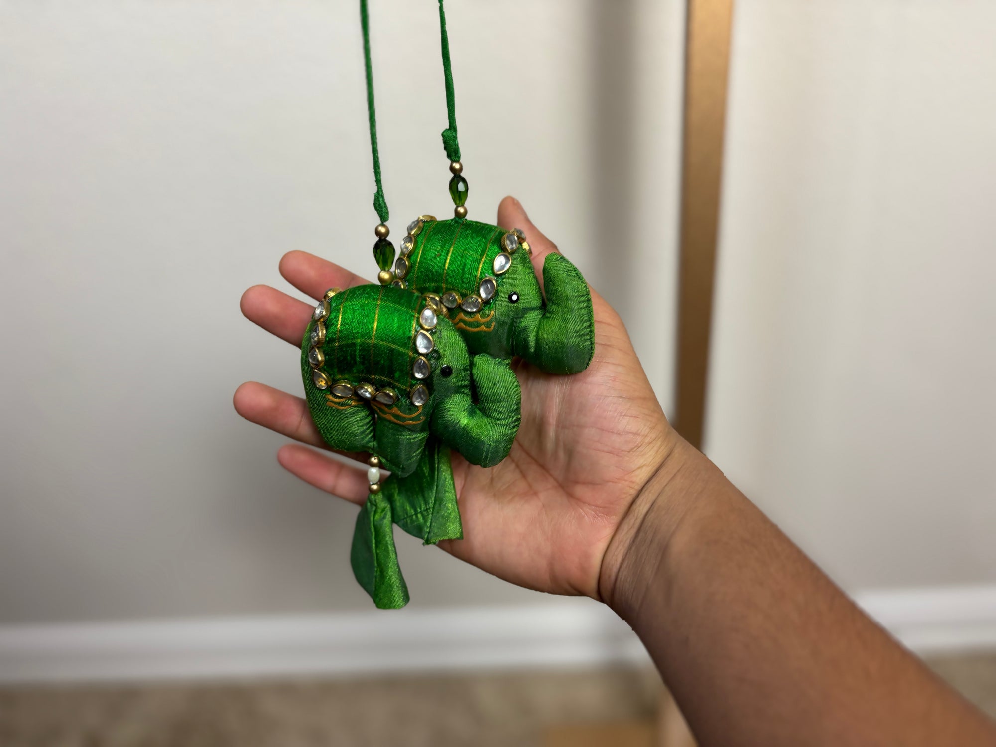 Green Blouse with Elephant Tassels