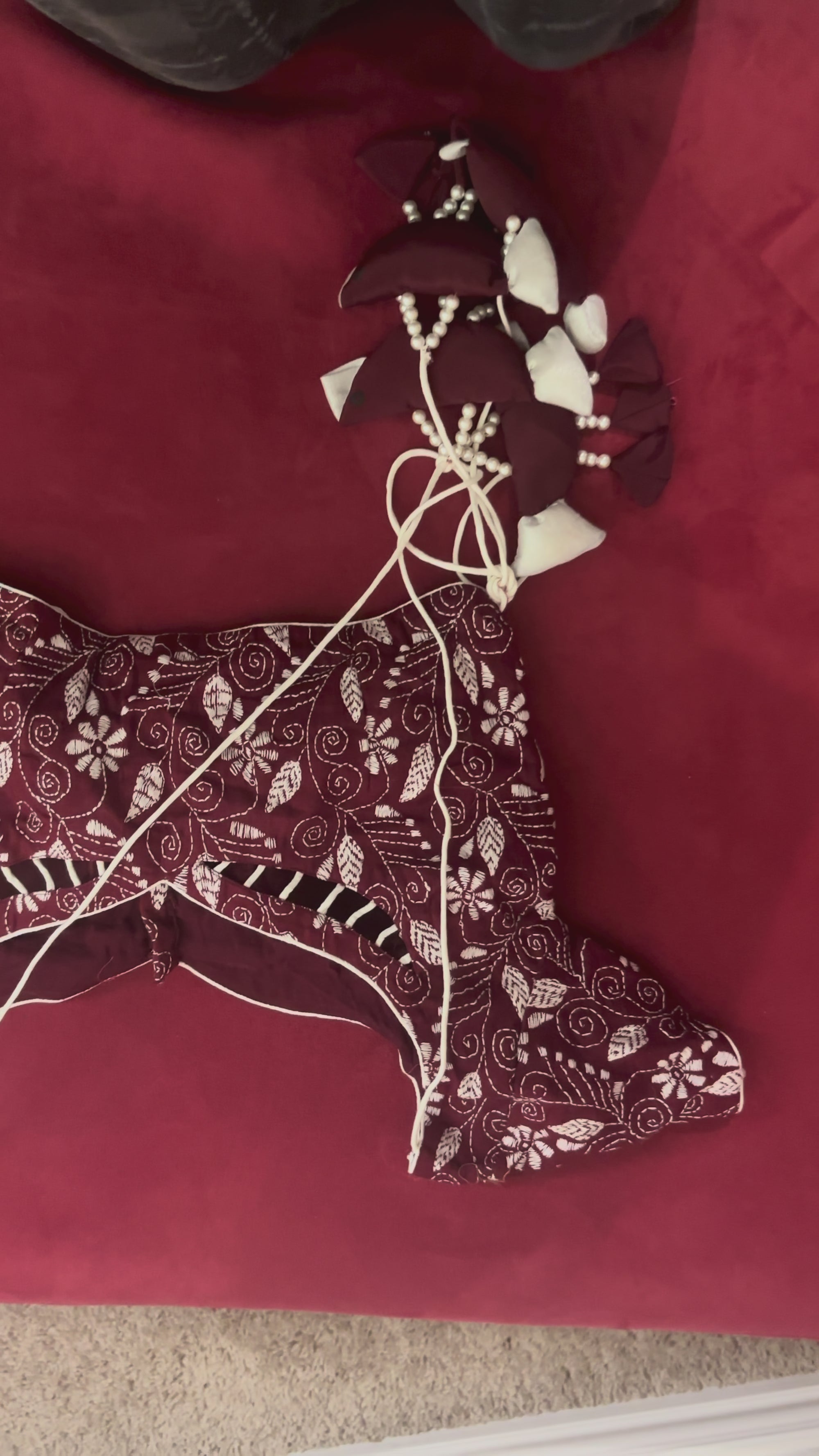 Maroon Blouse with White Patterns and Bird Like Tassels