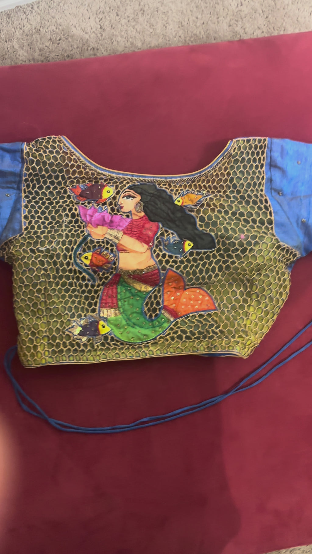 Blue and Gold Painting Blouse with Orange Fishing Tassels with Painting of a Woman on the Back