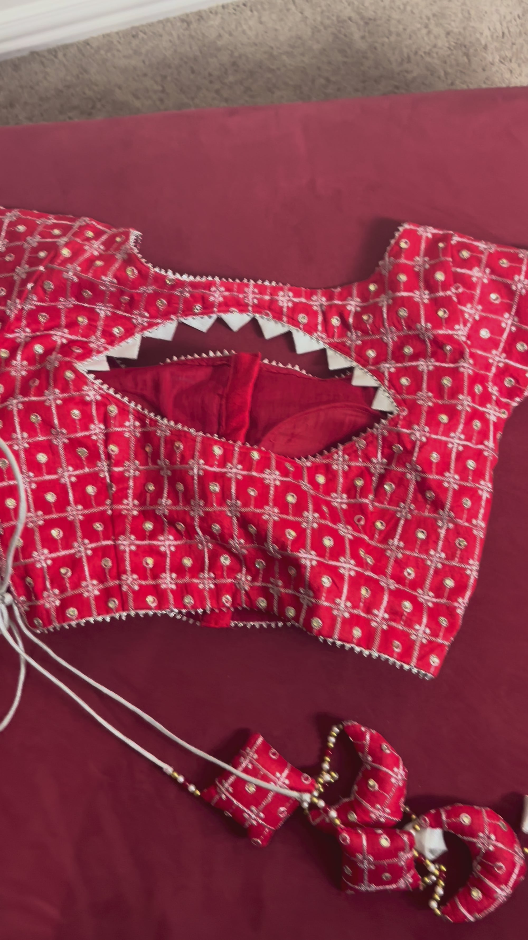 Red Blouse with Crescent Tassels