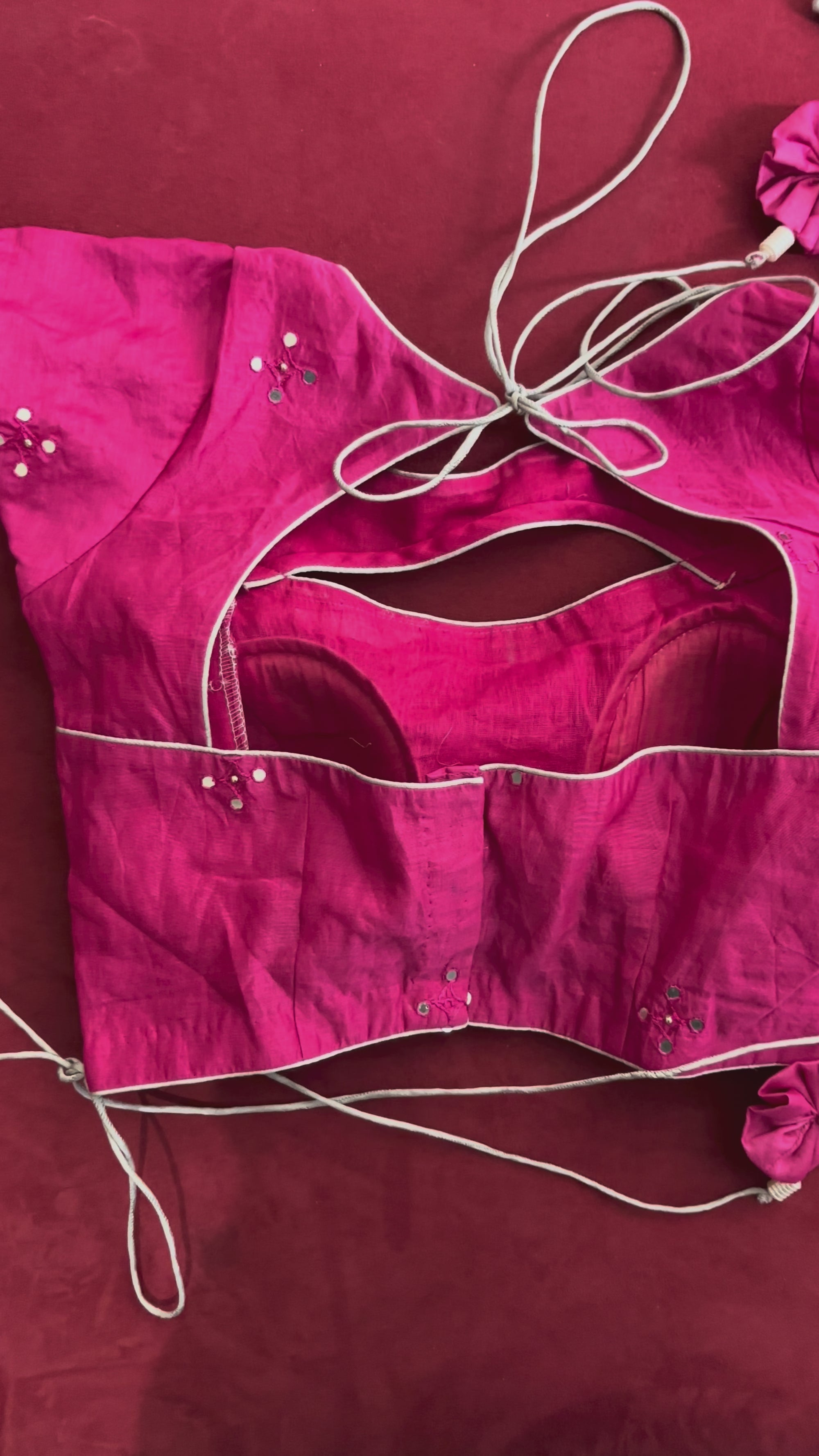 Pink Blouse with Circular Tassels and Silver Additions