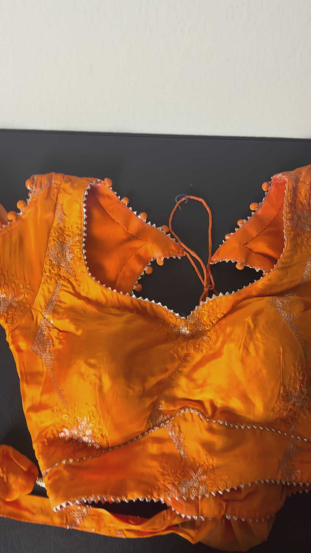 Orange Blouse with Triangle Tassels